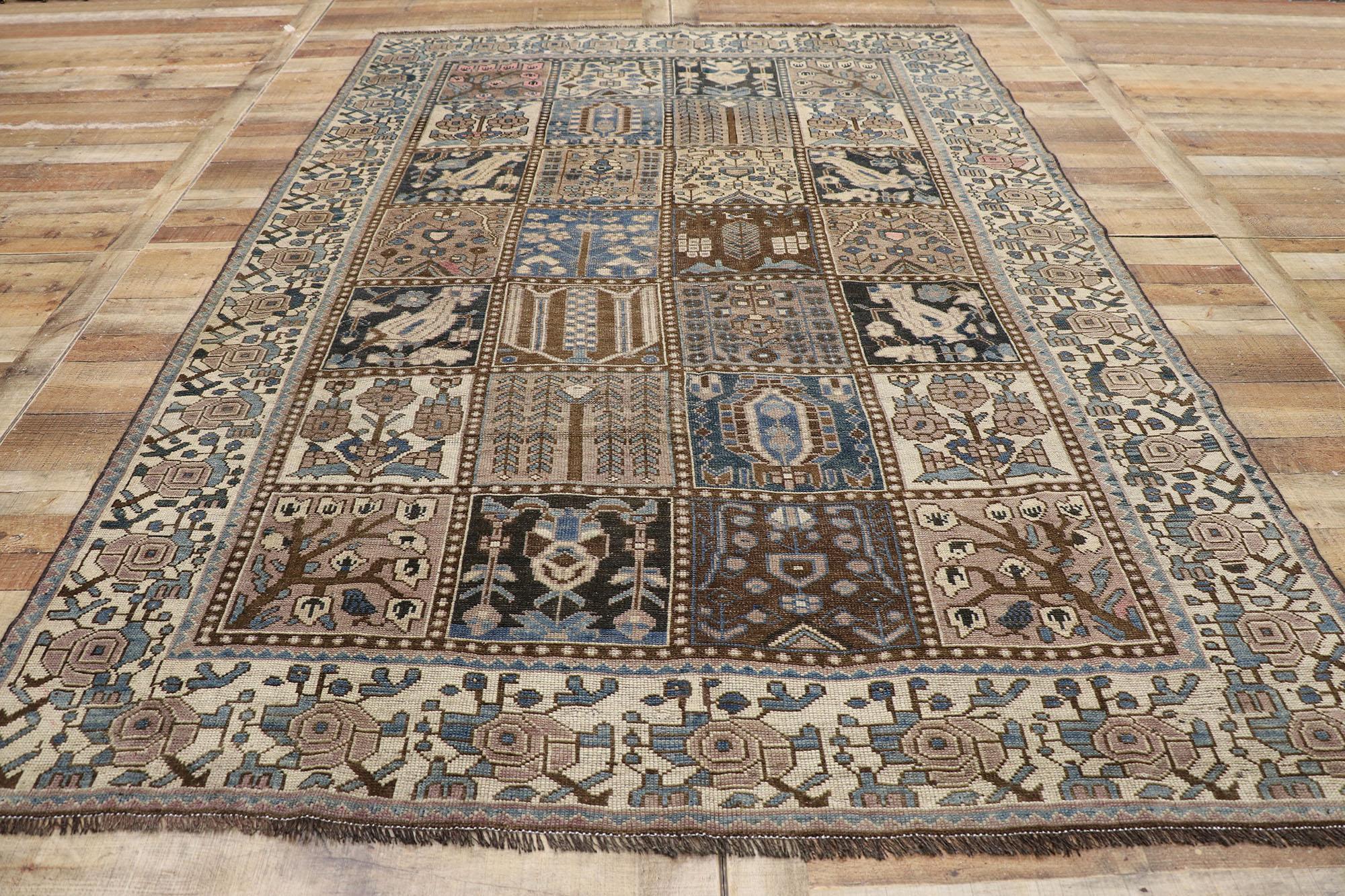 Wool Distressed Antique Persian Shiraz Rug with Garden Panel Four Seasons Design For Sale