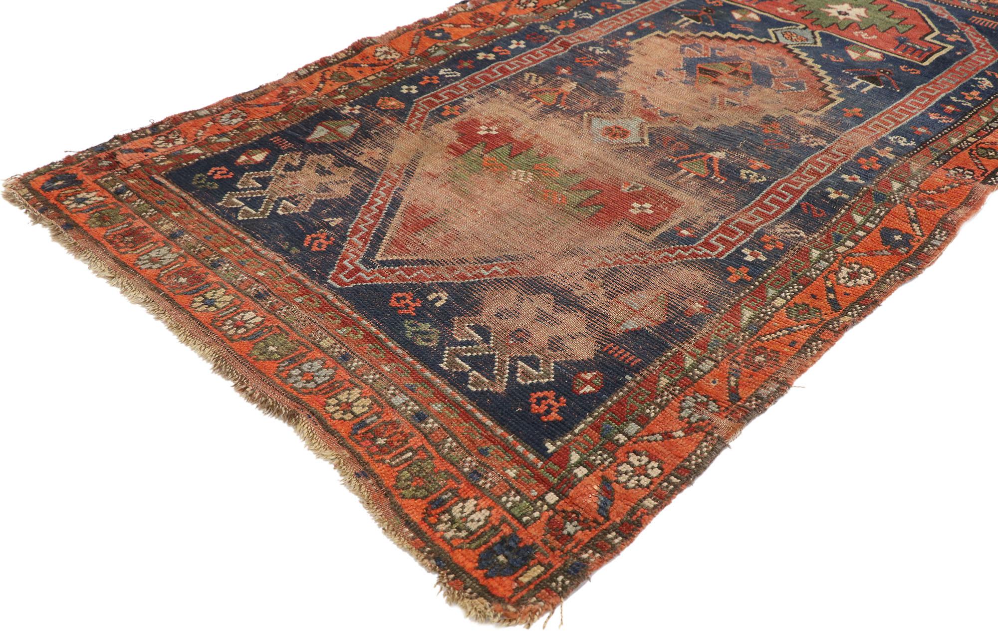 77659 Distressed Antique Persian Shiraz rug with Rustic Tribal style 03'00 x 05'02. Full of tiny details and a bold expressive design combined with exuberant colors and tribal style, this hand-knotted wool distressed antique Persian Shiraz rug is a