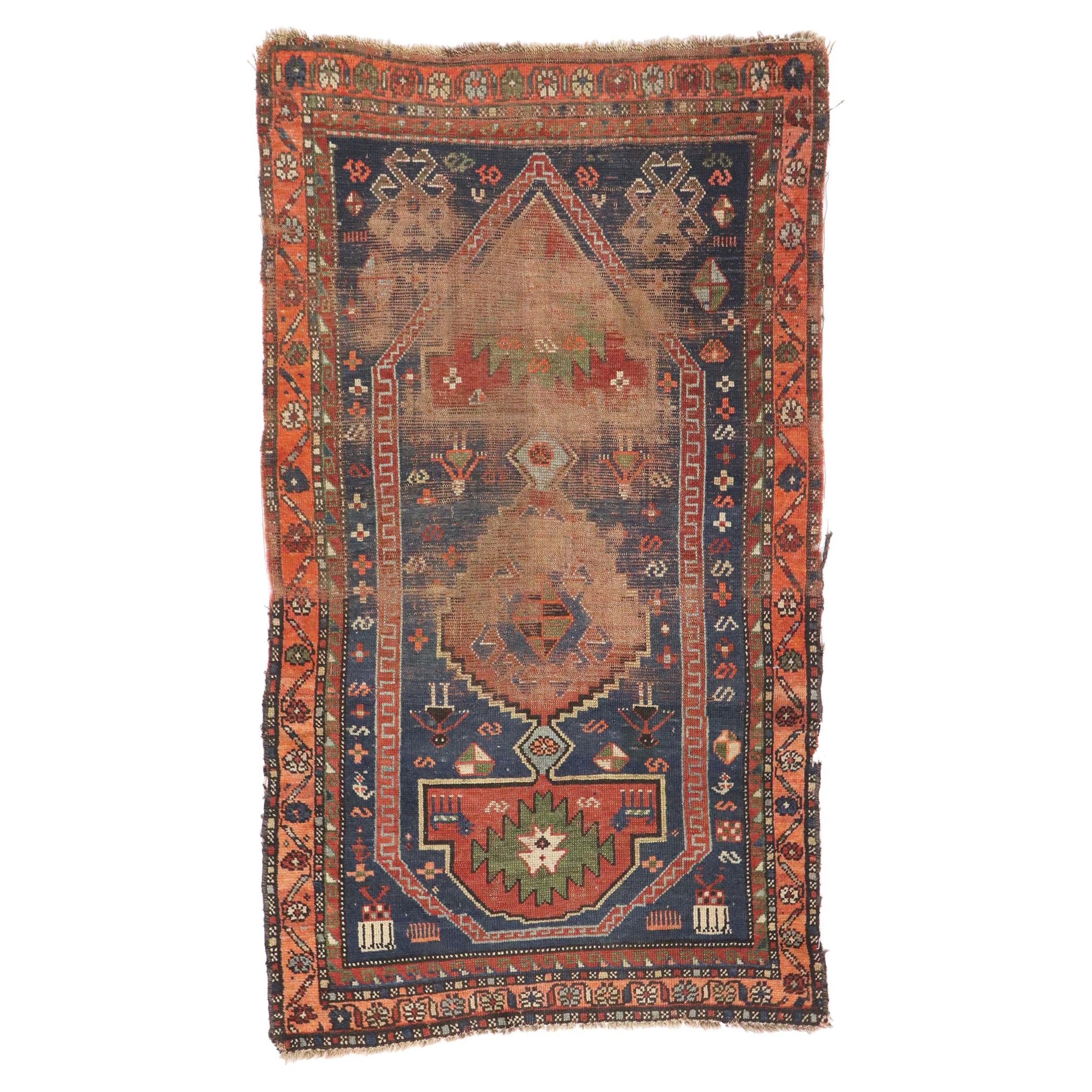 Distressed Antique Persian Shiraz Rug with Rustic Tribal Style For Sale