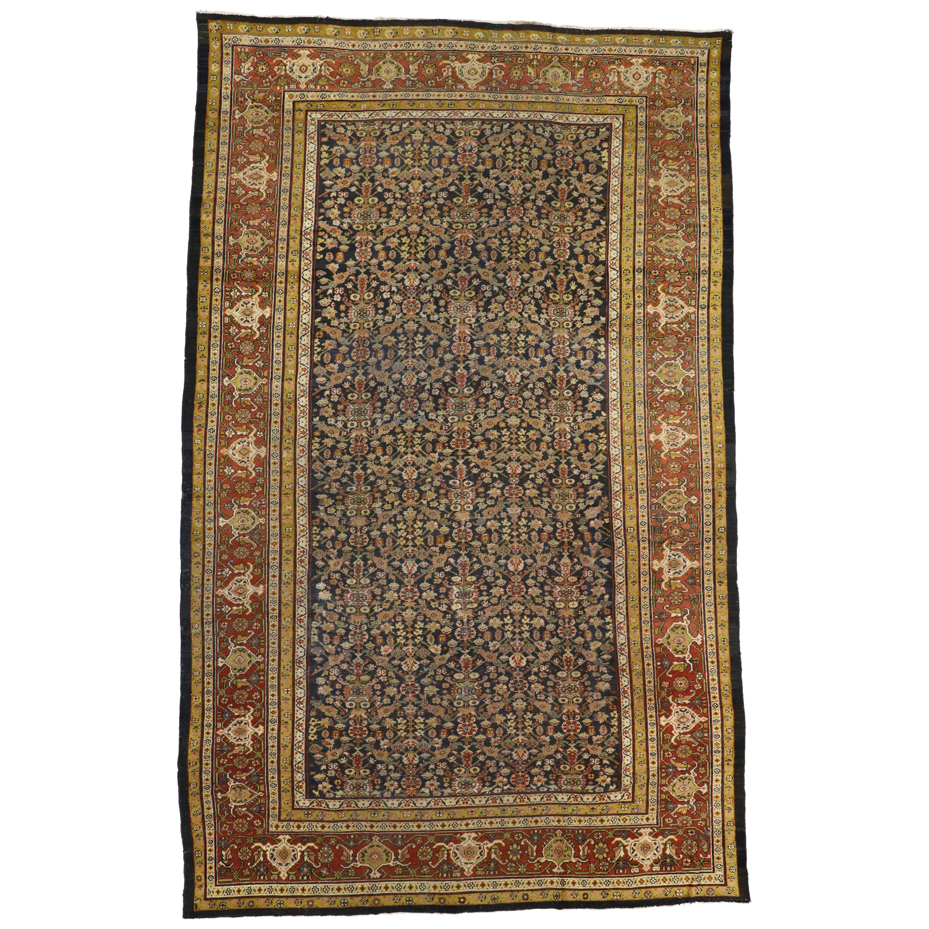 Distressed Antique Persian Sultanabad Palace Rug with Industrial Artisan Style For Sale
