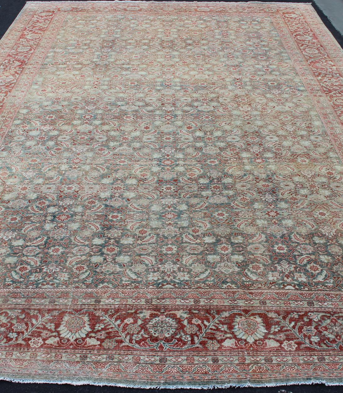 Distressed Antique Persian Sultanabad Rug in Faded Blue Background For Sale 2
