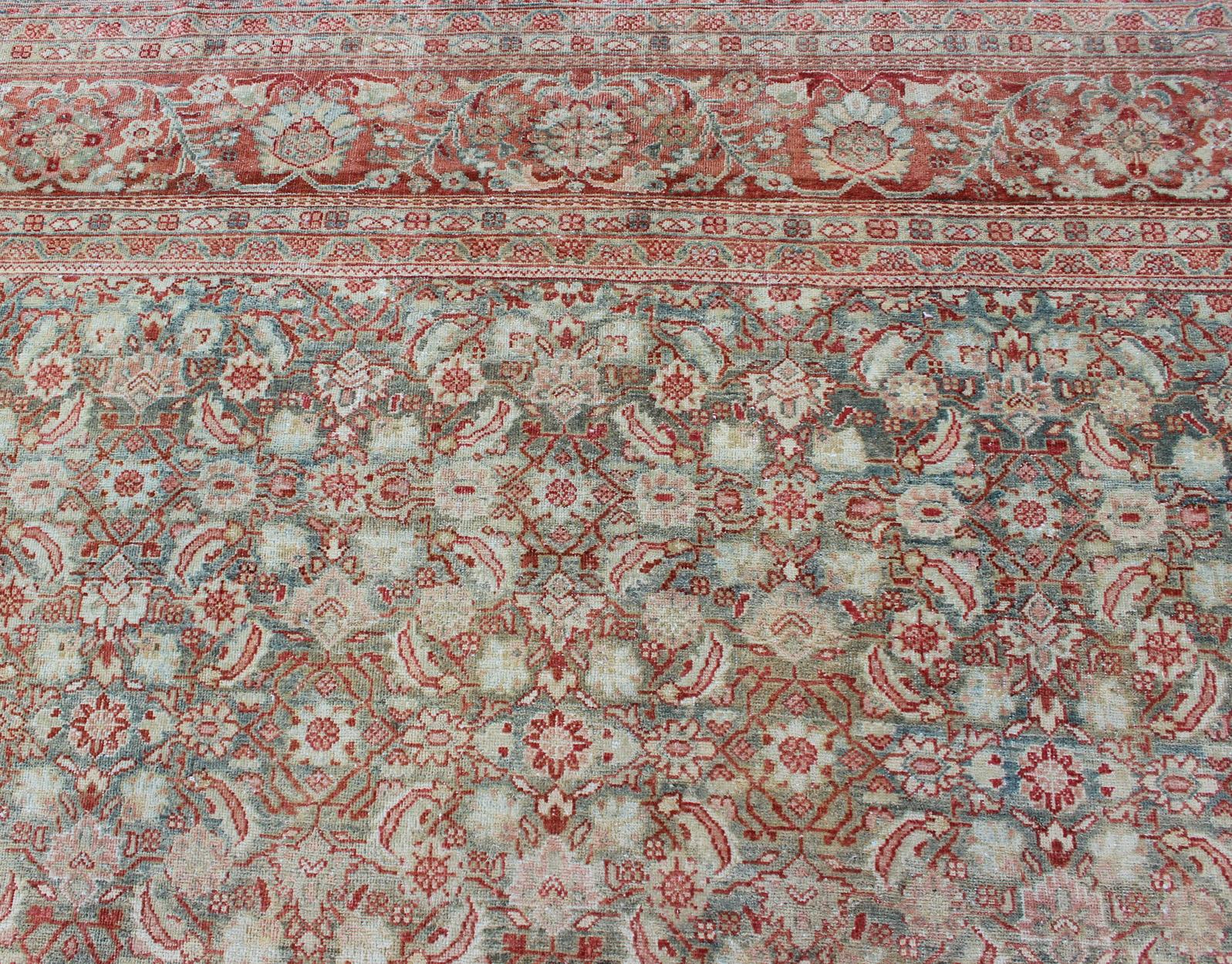 Distressed Antique Persian Sultanabad Rug in Faded Blue Background For Sale 4