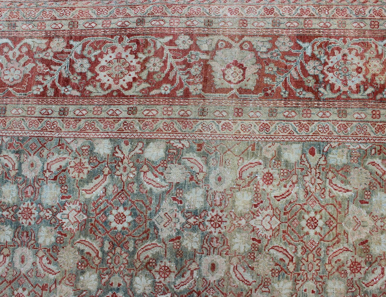Distressed Antique Persian Sultanabad Rug in Faded Blue Background For Sale 6