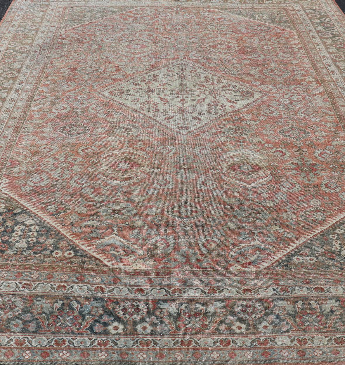 Distressed Antique Sultanabad Rug in Faded Red Background, Charcoal Border For Sale 3
