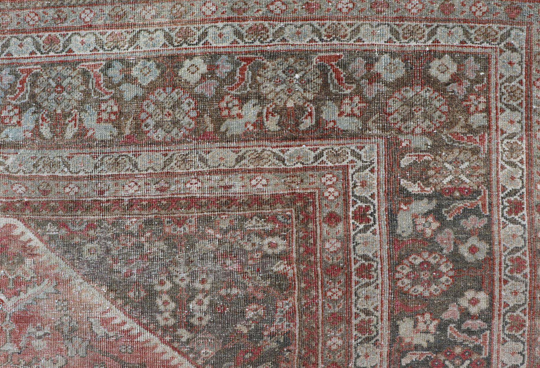 20th Century Distressed Antique Sultanabad Rug in Faded Red Background, Charcoal Border For Sale