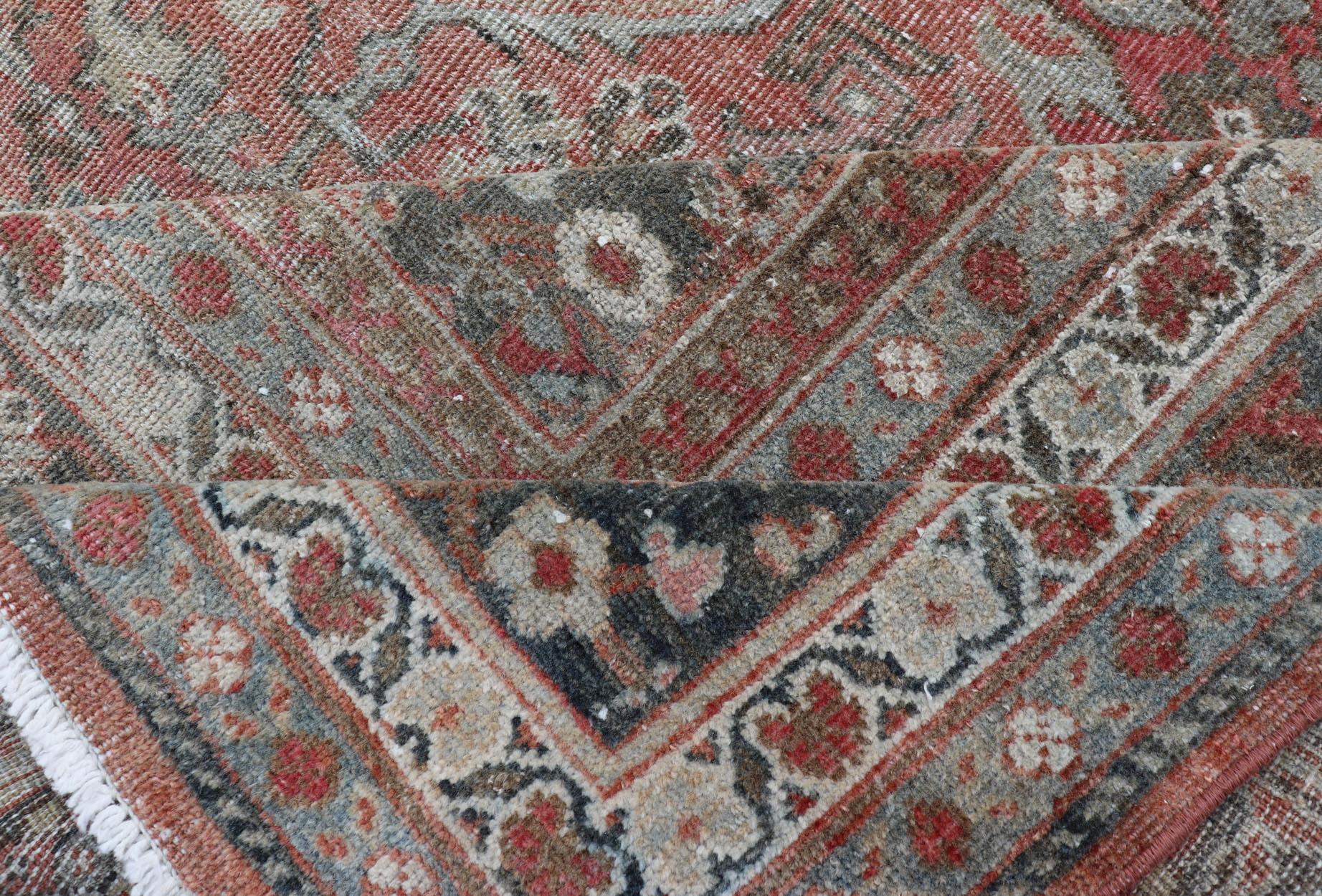 Distressed Antique Sultanabad Rug in Faded Red Background, Charcoal Border For Sale 1