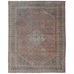 Distressed Antique Sultanabad Rug in Faded Red Background, Charcoal Border