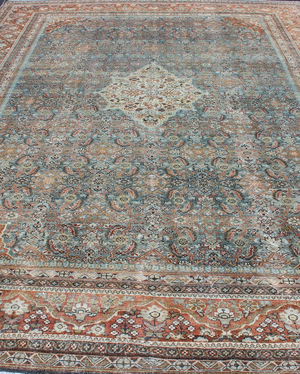 Distressed Antique Persian Sultanabad Rug in Steel Blue Background, Green, Red For Sale 4