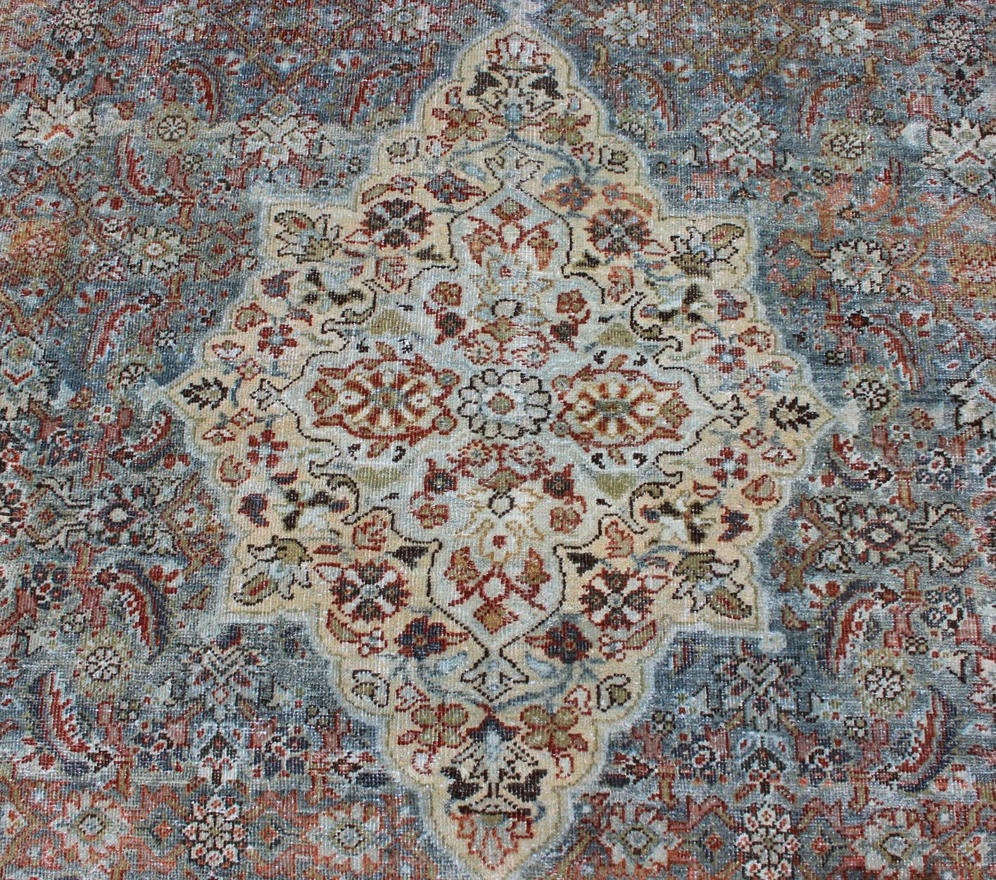Distressed Antique Persian Sultanabad Rug in Steel Blue Background, Green, Red For Sale 7