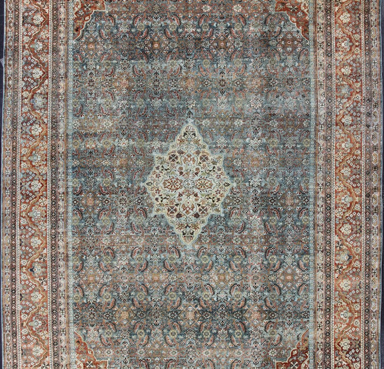 Sultanabad Mahal antique rug from Persia with all-over geometric design and small medallion and four cornices. Keivan Woven Arts/ rug 1912-175, country of origin / type: Iran / Mahal, circa 1920
Measures: 11'7 x 16'8 
This beautiful antique Persian