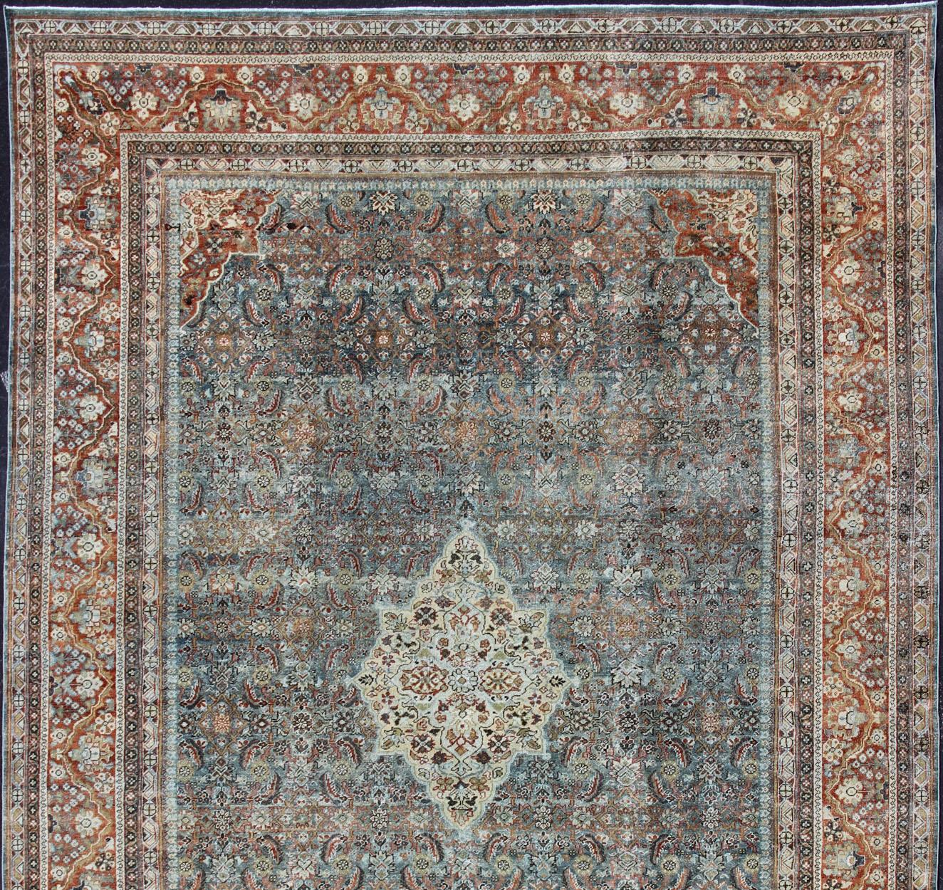 Distressed Antique Persian Sultanabad Rug in Steel Blue Background, Green, Red In Good Condition For Sale In Atlanta, GA