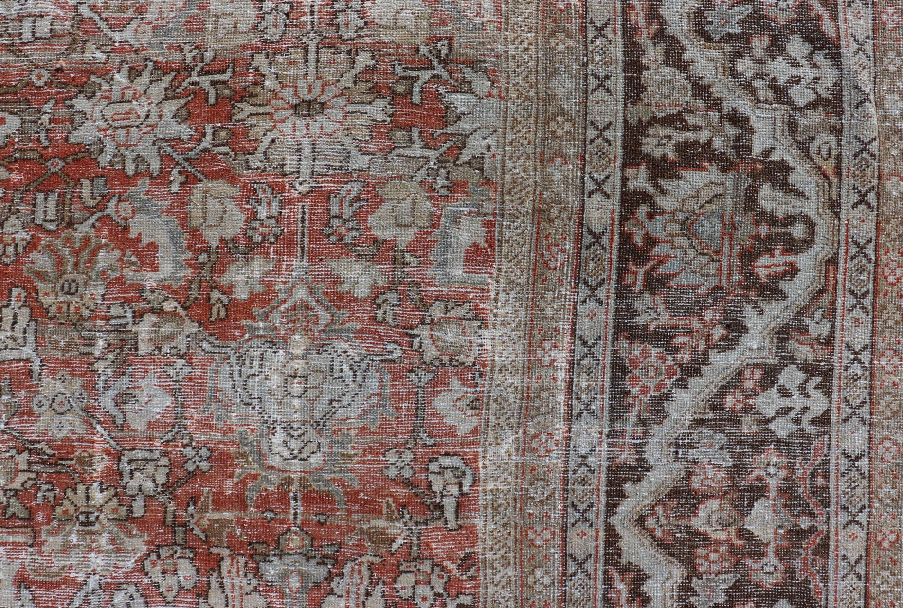 Hand-Knotted Distressed Antique Persian Sultanabad Rug in Wool with Floral Design For Sale