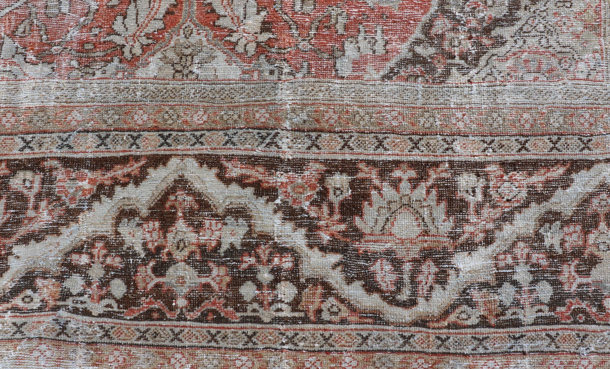 Distressed Antique Persian Sultanabad Rug in Wool with Floral Design For Sale 1