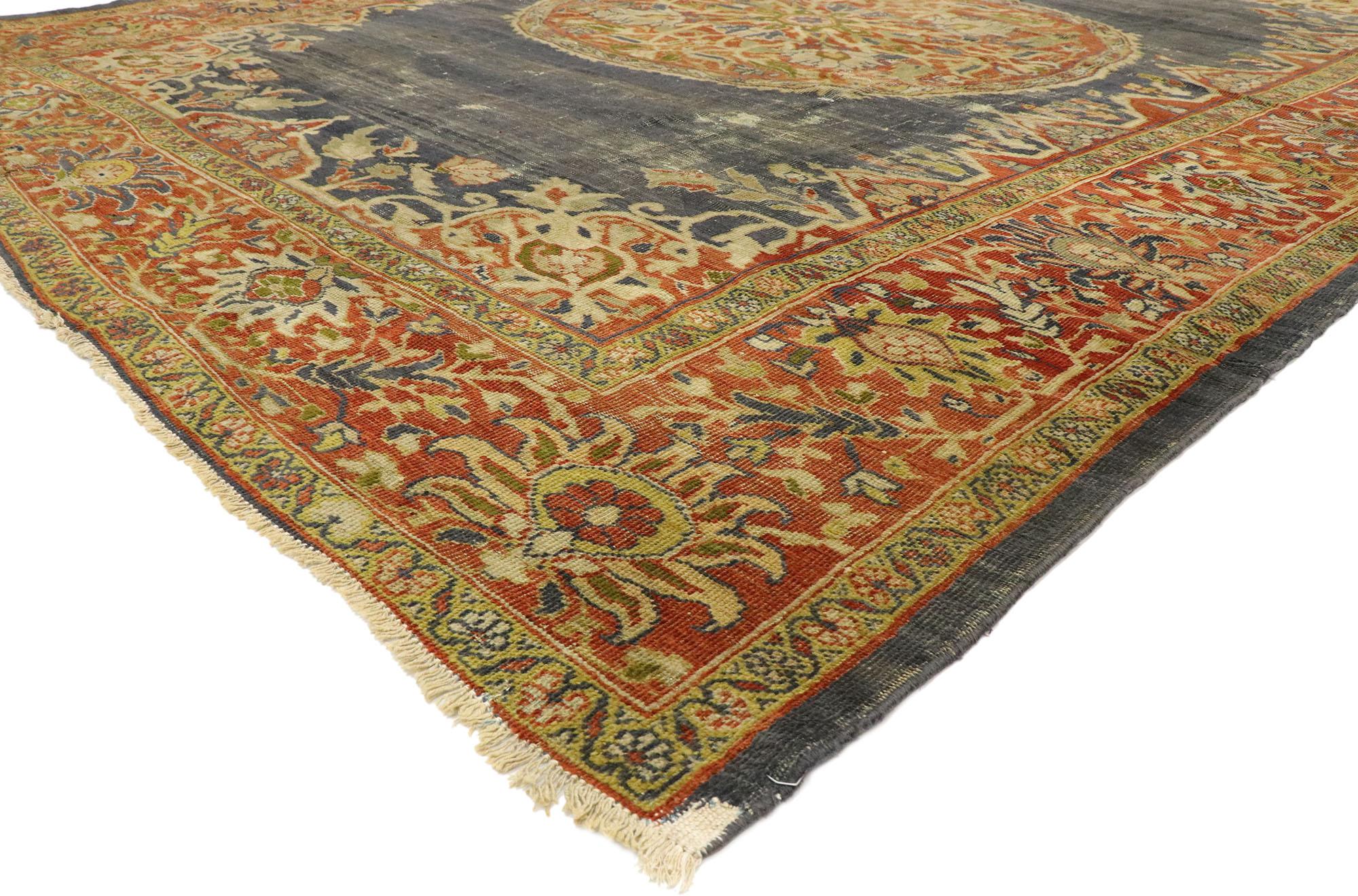 76796 Distressed Antique Persian Sultanabad rug with Rustic Artisan Industrial style. With its time-softened color palette and weathered charm, this hand knotted wool distressed Persian Sultanabad area rug beautifully showcases a rustic Artisan