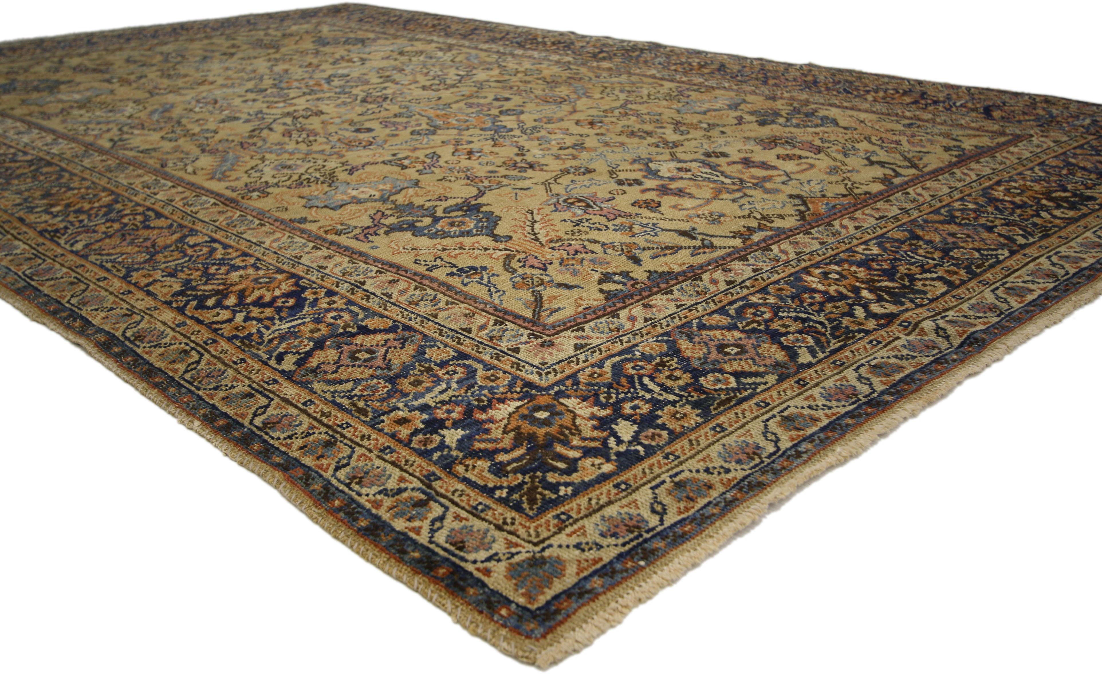 74036 Distressed Antique Persian Sultanabad Rug with Rustic Spanish Colonial Style 06'04 x 09'10. This hand knotted wool distressed antique Persian Sultanabad rug features an all-over floral lattice composed of palmettes, rosettes, leafy tendrils,