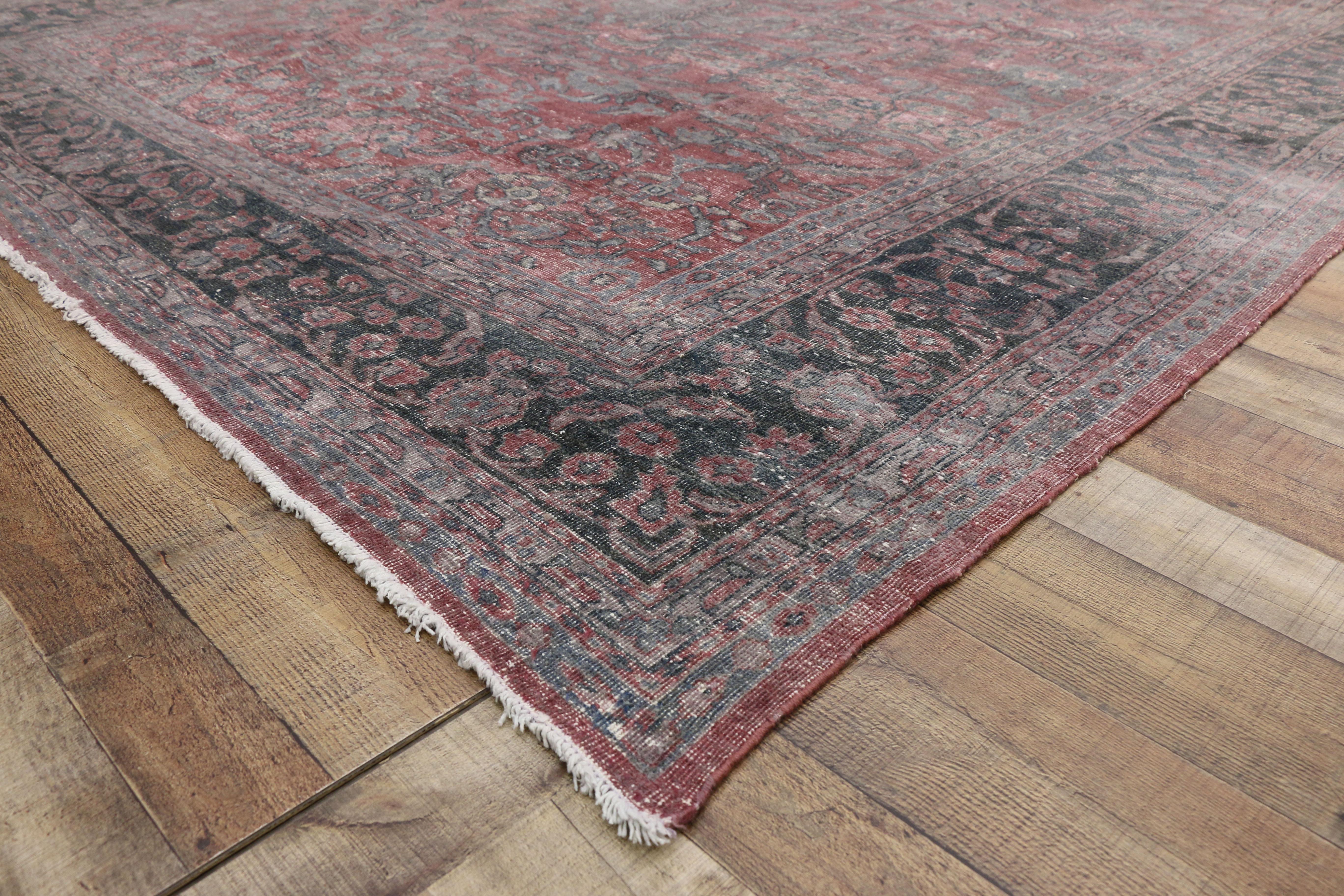 20th Century Distressed Antique Persian Tabriz Area Rug For Sale