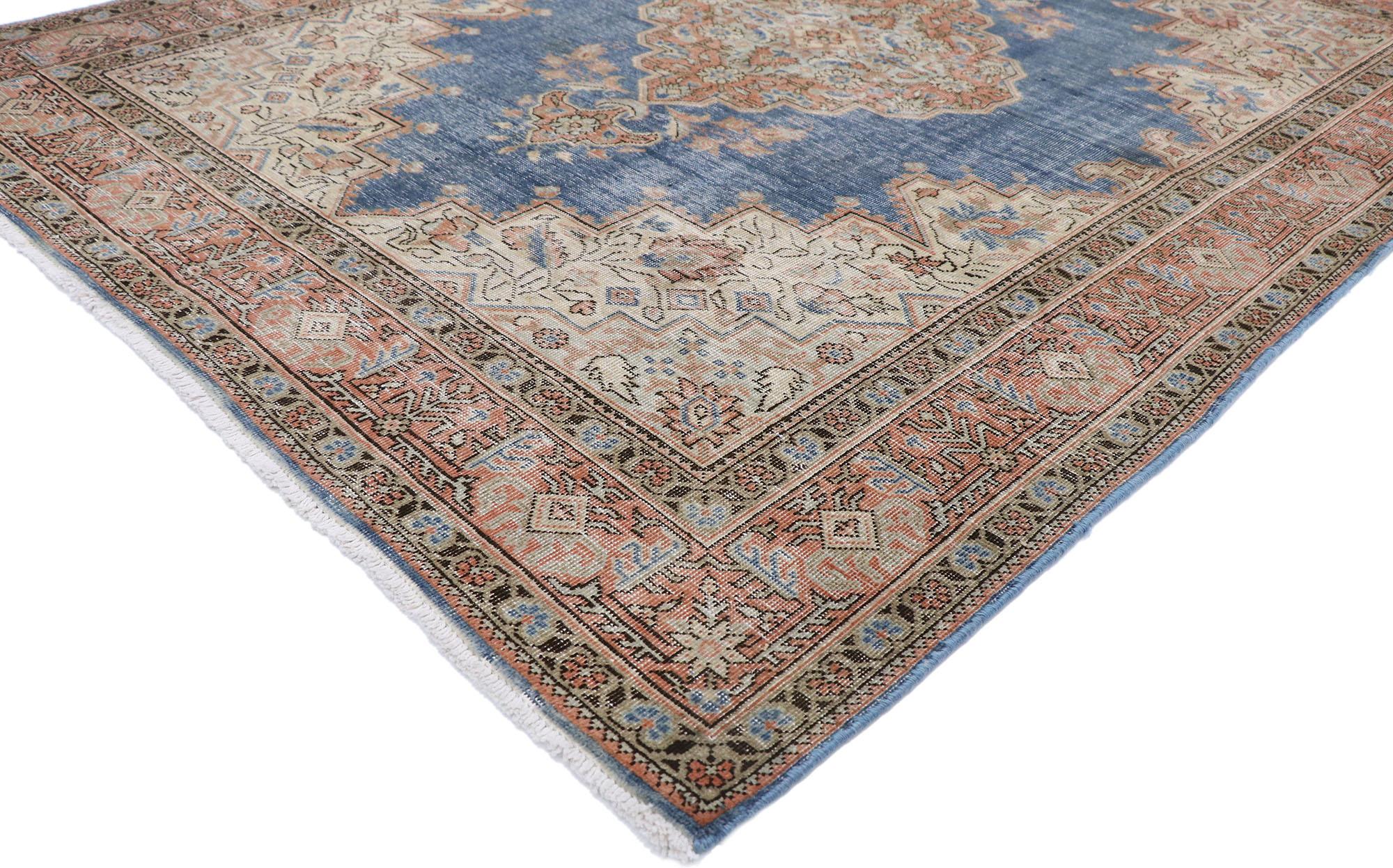 60876 Distressed Antique Persian Tabriz rug, 05'05 x 07'00.
with its timeless design and lovingly time-worn composition, this hand knotted wool antique Persian Tabriz rug is a captivating vision of woven beauty. The eye-catching botanical pattern