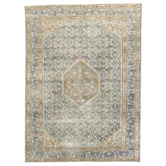 Distressed Antique Persian Tabriz Rug with Rustic Coastal Style