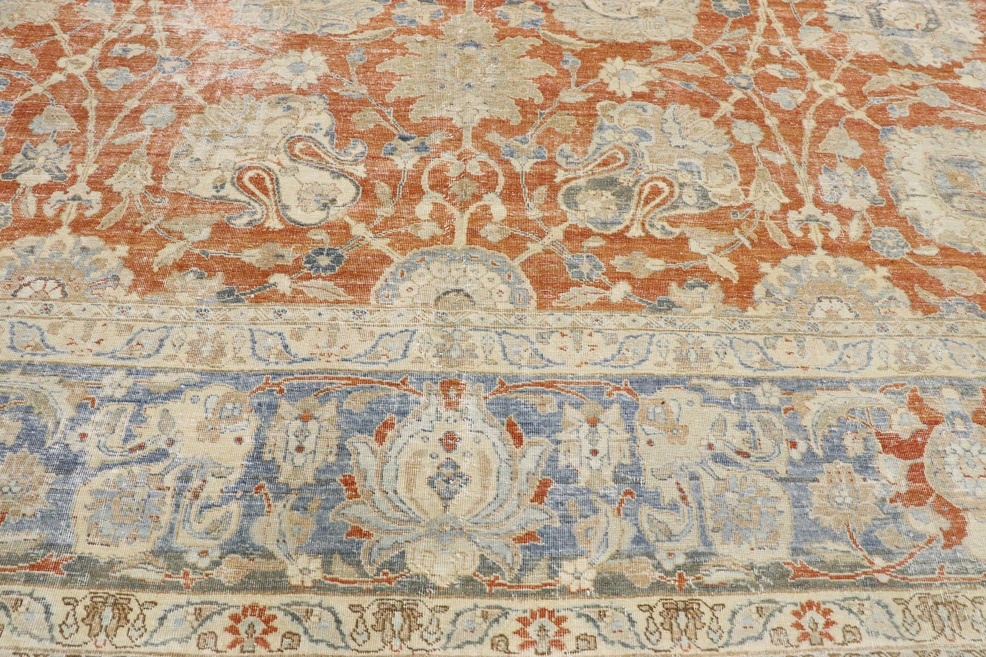 20th Century Distressed Antique Persian Tabriz Rug with Rustic Colonial Style