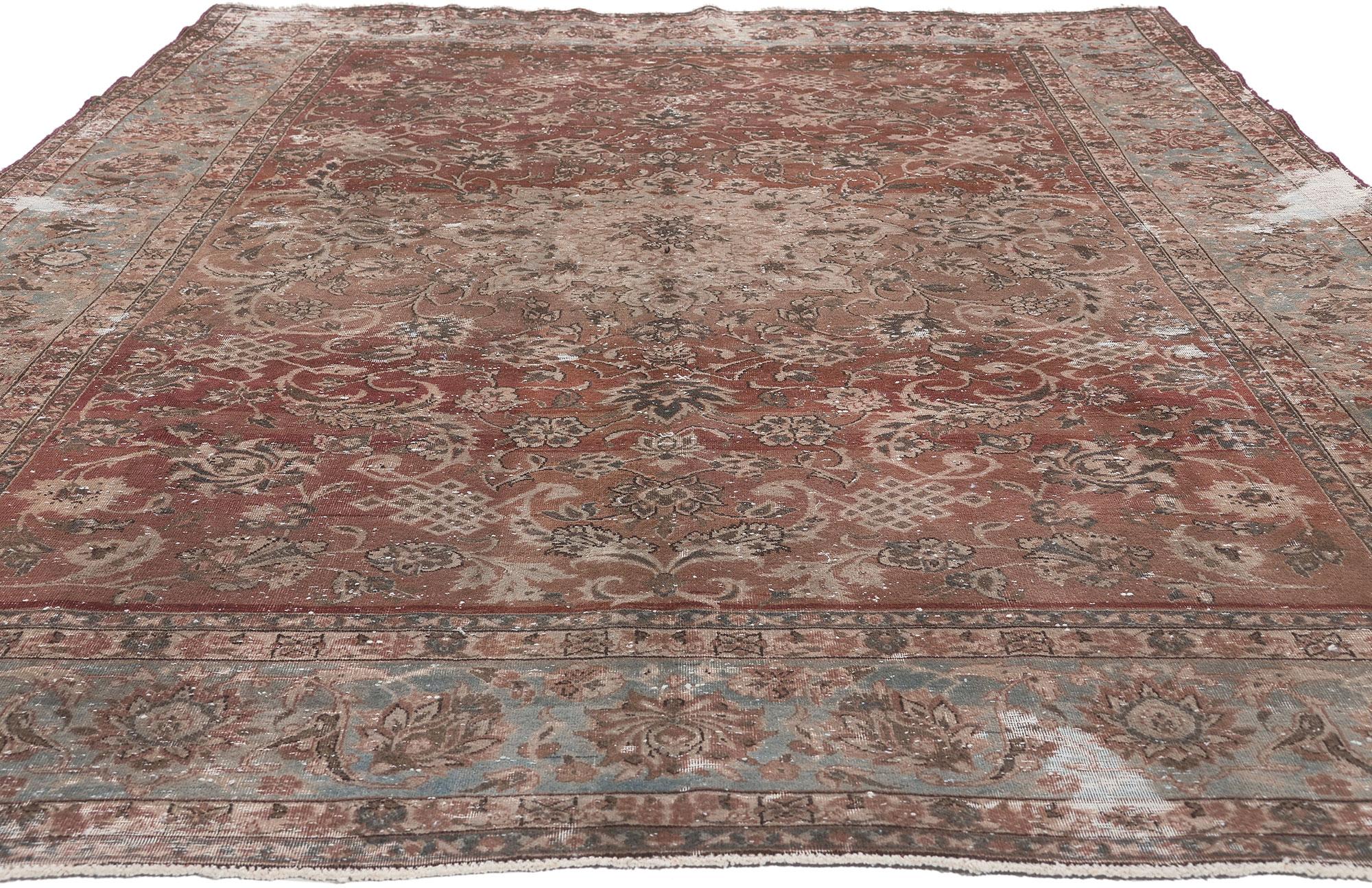 Hand-Knotted Distressed Antique Persian Tabriz Rug with Rustic Earth-Tone Colors For Sale