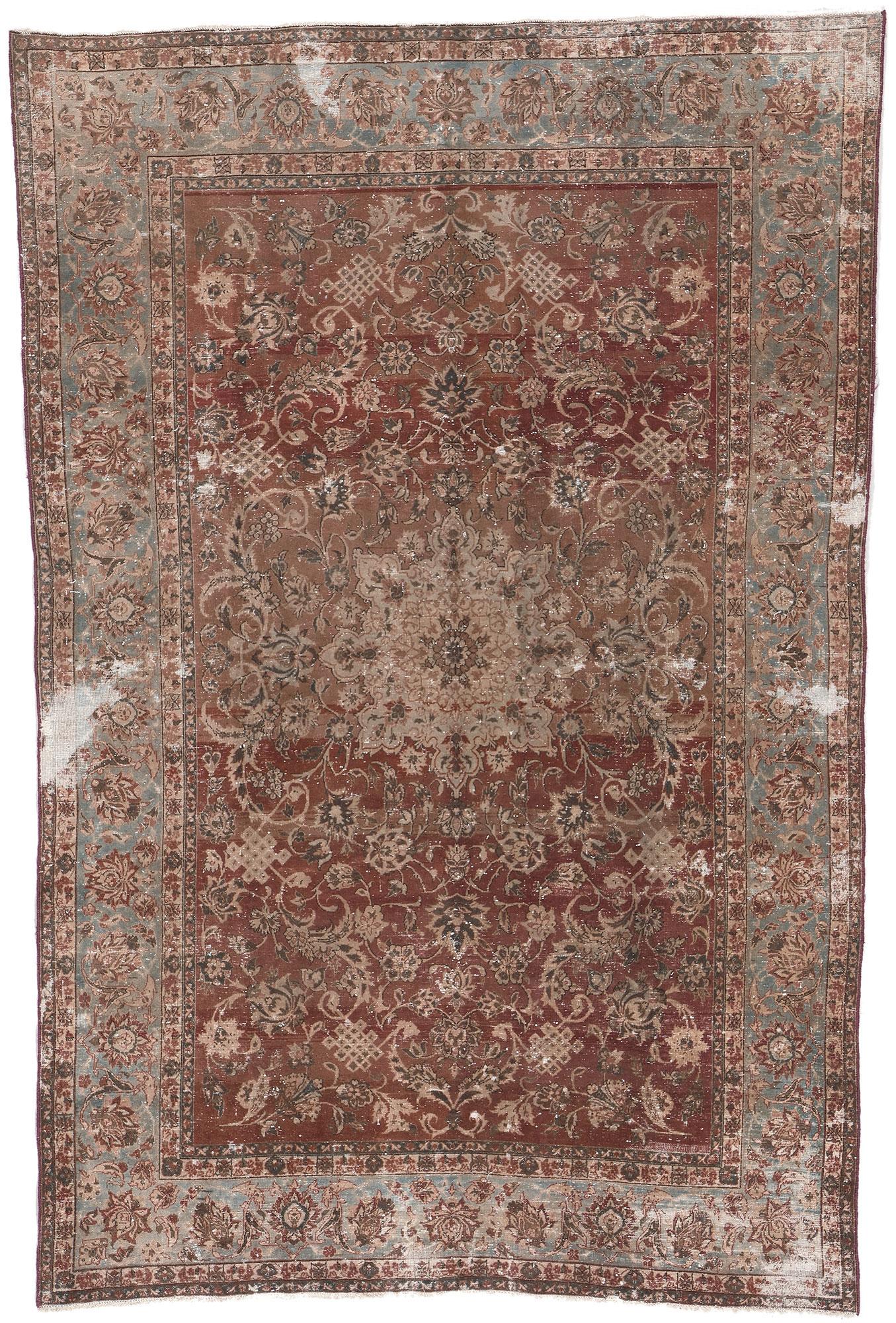 Distressed Antique Persian Tabriz Rug with Rustic Earth-Tone Colors