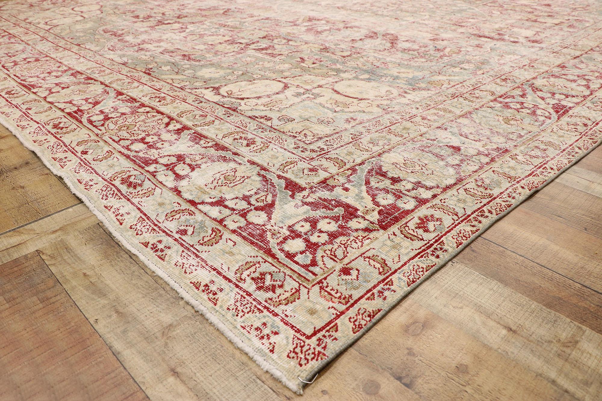 Wool Distressed Antique Persian Tabriz Rug with Rustic English Chintz Style For Sale