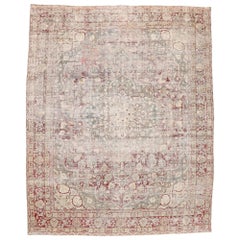 Distressed Antique Persian Tabriz Rug with Rustic English Chintz Style