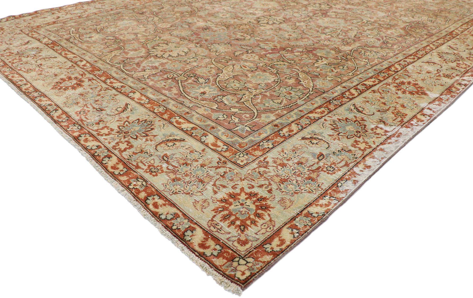 60846, distressed antique Persian Tabriz rug with rustic Italian Tuscan style. Cleverly composed and distinctively well-balanced, this hand knotted wool distressed antique Persian Tabriz rug will take on a curated lived-in look that feels timeless