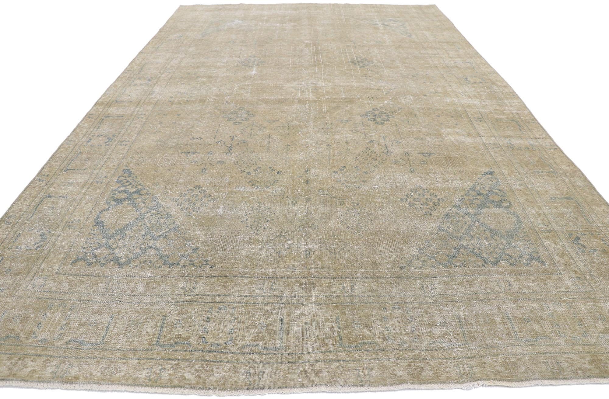 Malayer Distressed Antique Persian Tabriz Rug with Rustic Plantation Style For Sale