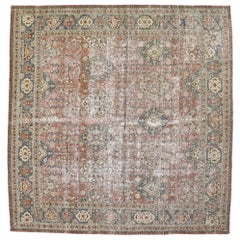 Distressed Antique Persian Tabriz Rug with Rustic Spanish Colonial Style