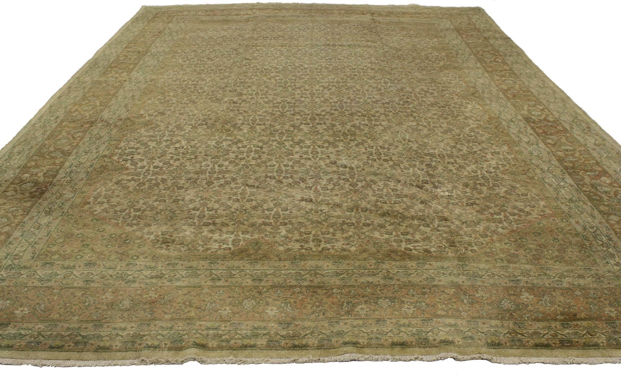 Hand-Knotted Distressed Antique Persian Tabriz Rug with Traditional Style For Sale