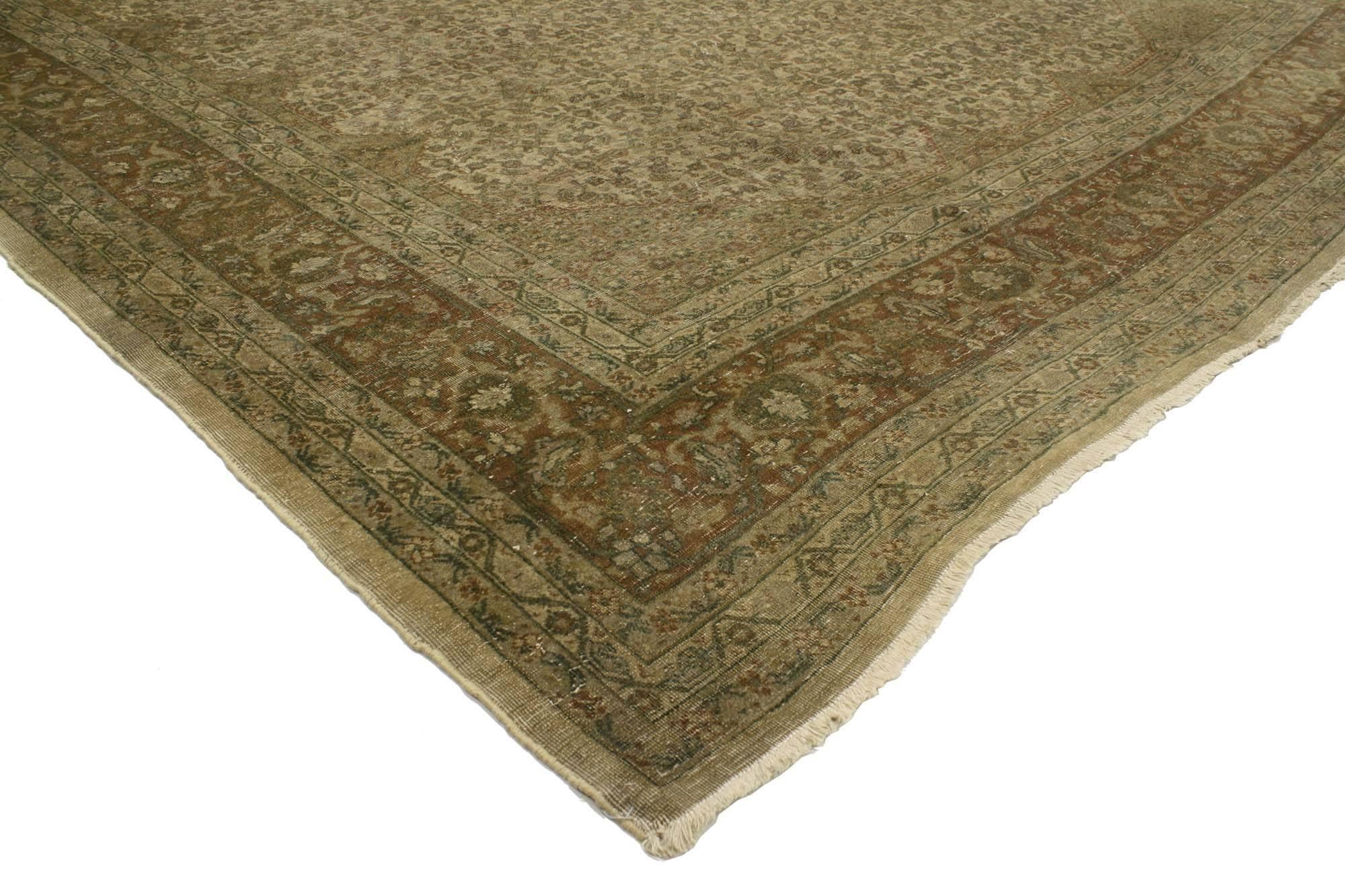 73097 Distressed Antique Persian Tabriz Rug with Modern Rustic English Style 09'08 x 13'09. With timeless elegance and nostalgic charm, this hand knotted wool distressed antique Persian Tabriz rug can beautifully blend modern, contemporary and