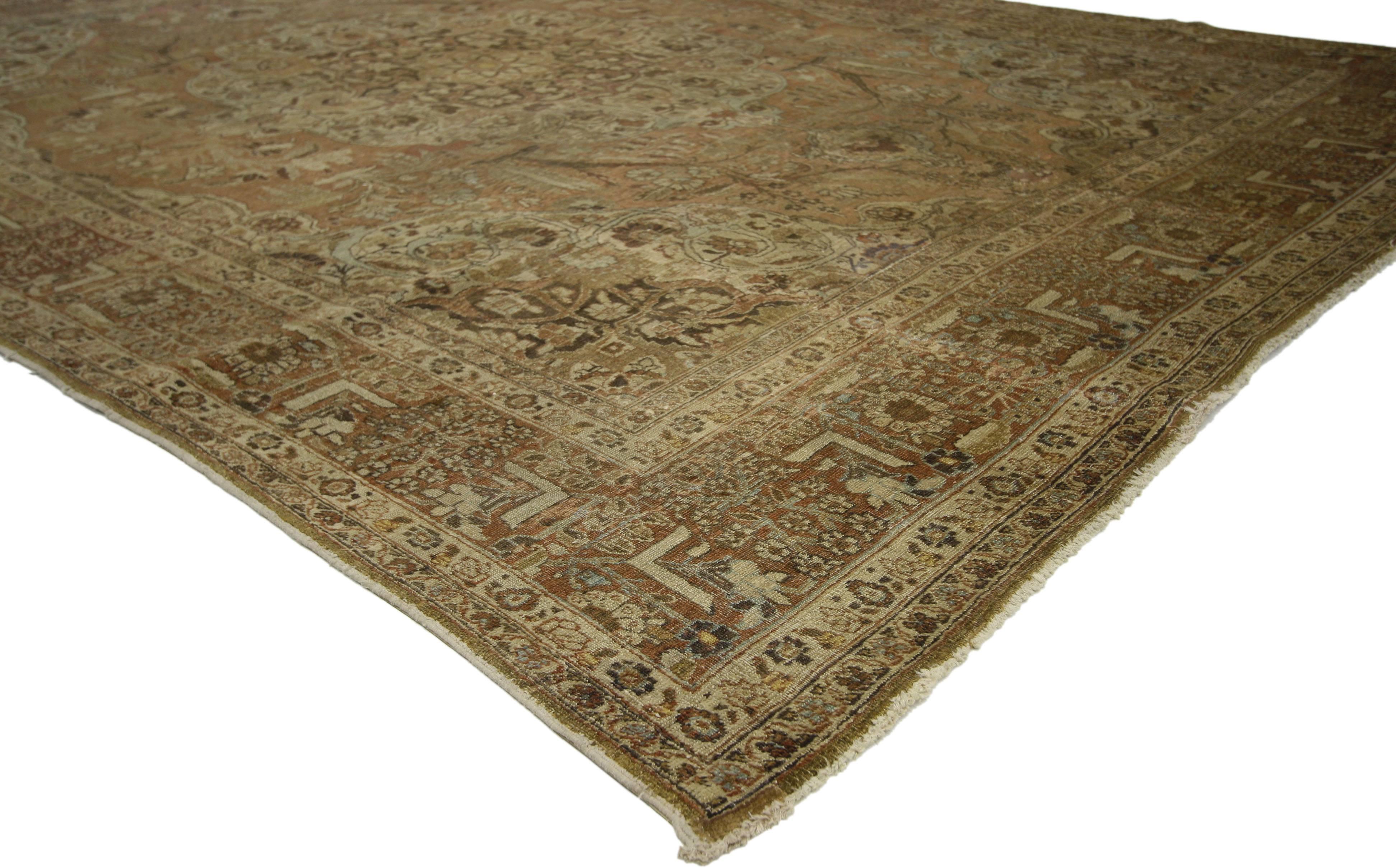 74182 Distressed Antique Persian Tabriz Rug with Rustic English Traditional Style 08'00 x 11'05. Balancing architectural elements of naturalistic forms with traditional sensibility and a lovingly timeworn patina, this hand knotted wool distressed