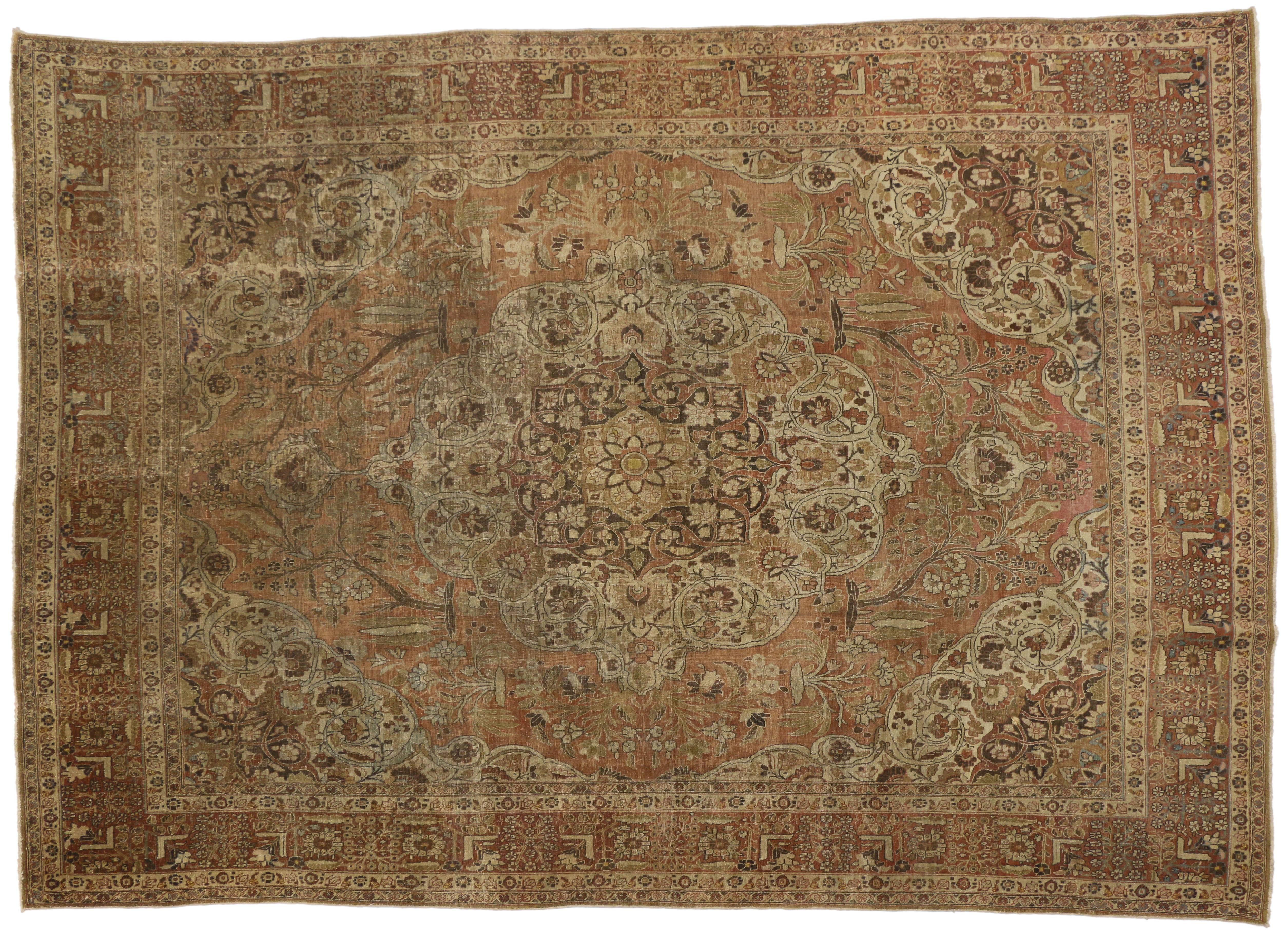 20th Century Distressed Antique Persian Tabriz Rug with Rustic English Traditional Style For Sale