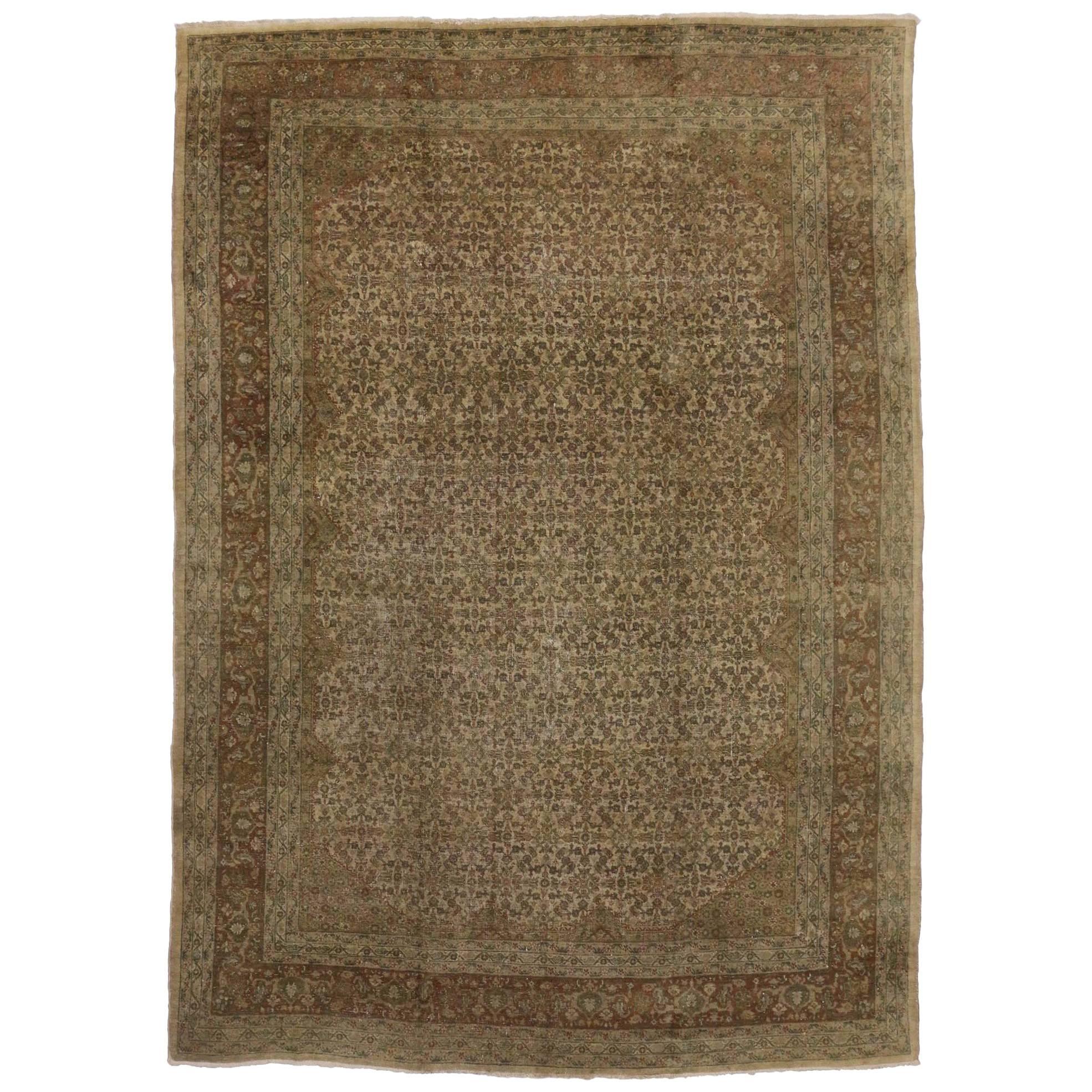 Distressed Antique Persian Tabriz Rug with Traditional Style