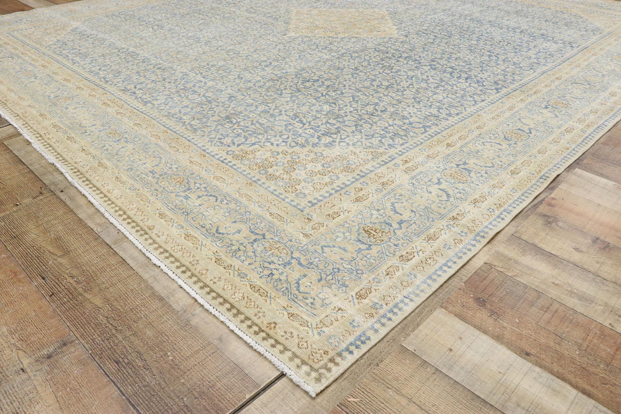 Wool Distressed Antique Persian Tabriz Rug with Transitional Coastal Style For Sale