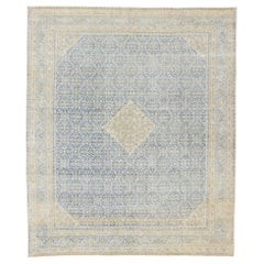Distressed Antique Persian Tabriz Rug with Transitional Coastal Style