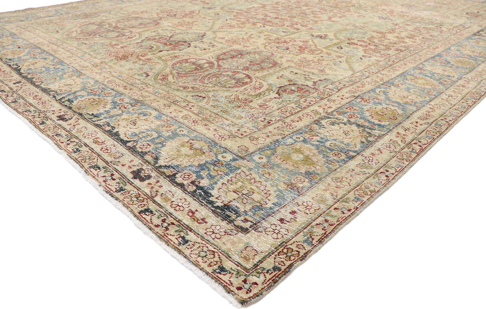 60841 Distressed antique Persian Yazd rug with Rustic English Chintz style. Balancing a timeless floral design with traditional sensibility and a lovingly timeworn patina, this hand-knotted wool distressed antique Persian Yazd rug beautifully