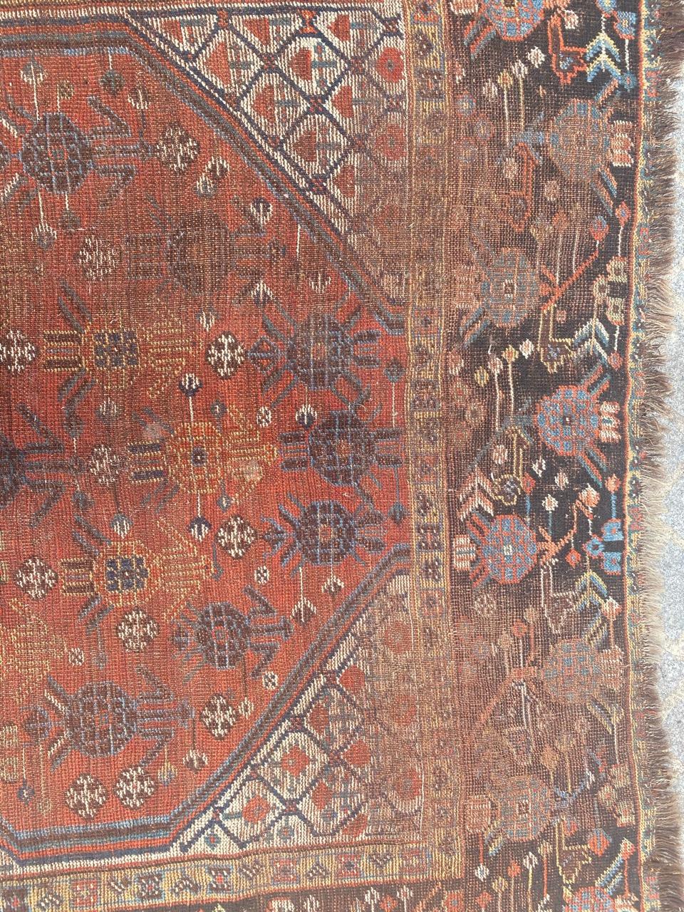 Hand-Knotted Distressed Antique Shiraz Rug For Sale