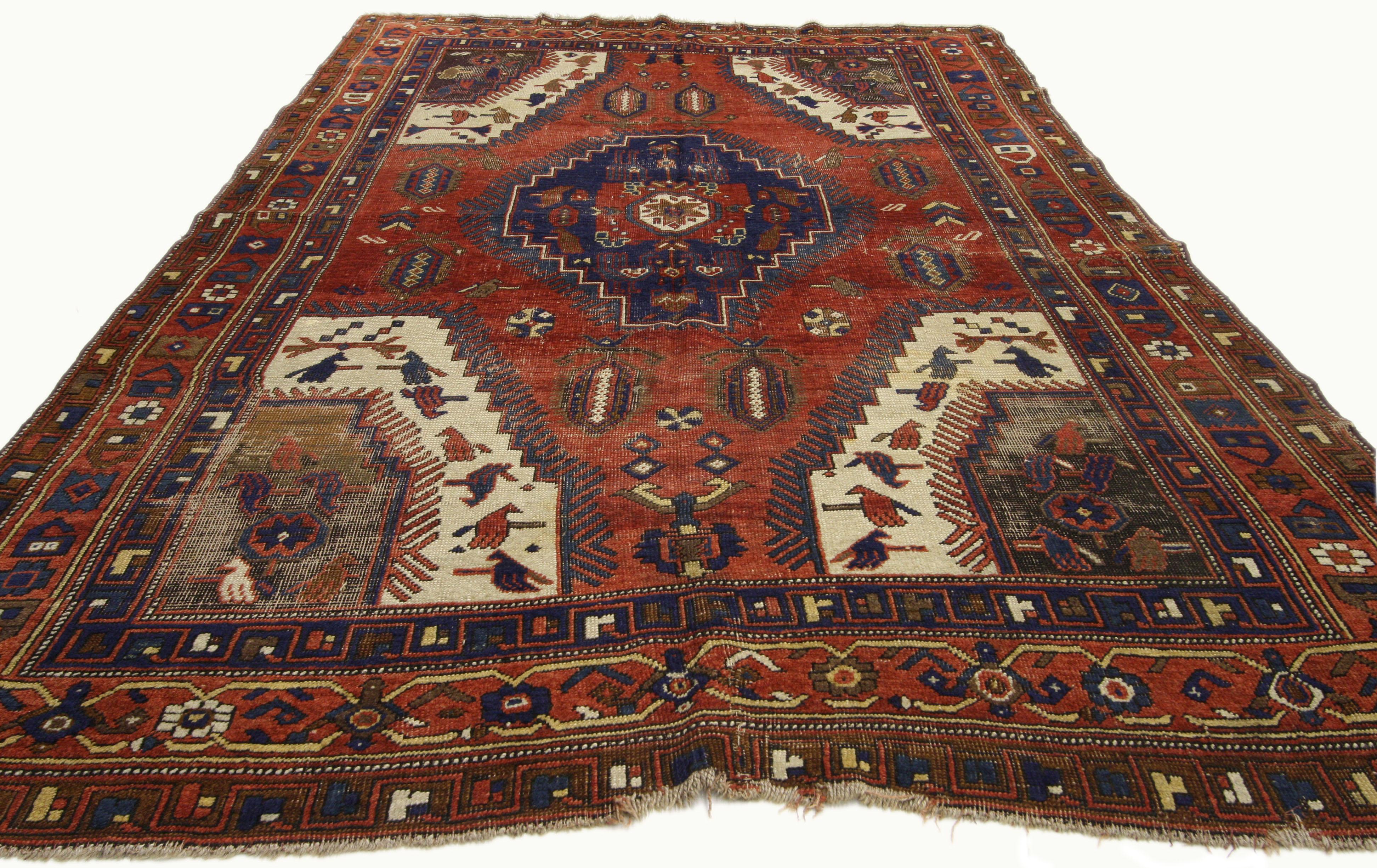 73263 Distressed Antique Turkish Bergama rug with Adirondack Style 05'03 x 08'02. This hand knotted wool antique Turkish Bergama rug with Adirondack Style displays a distressed composition with a rich and rustic design aesthetic. Set with a large