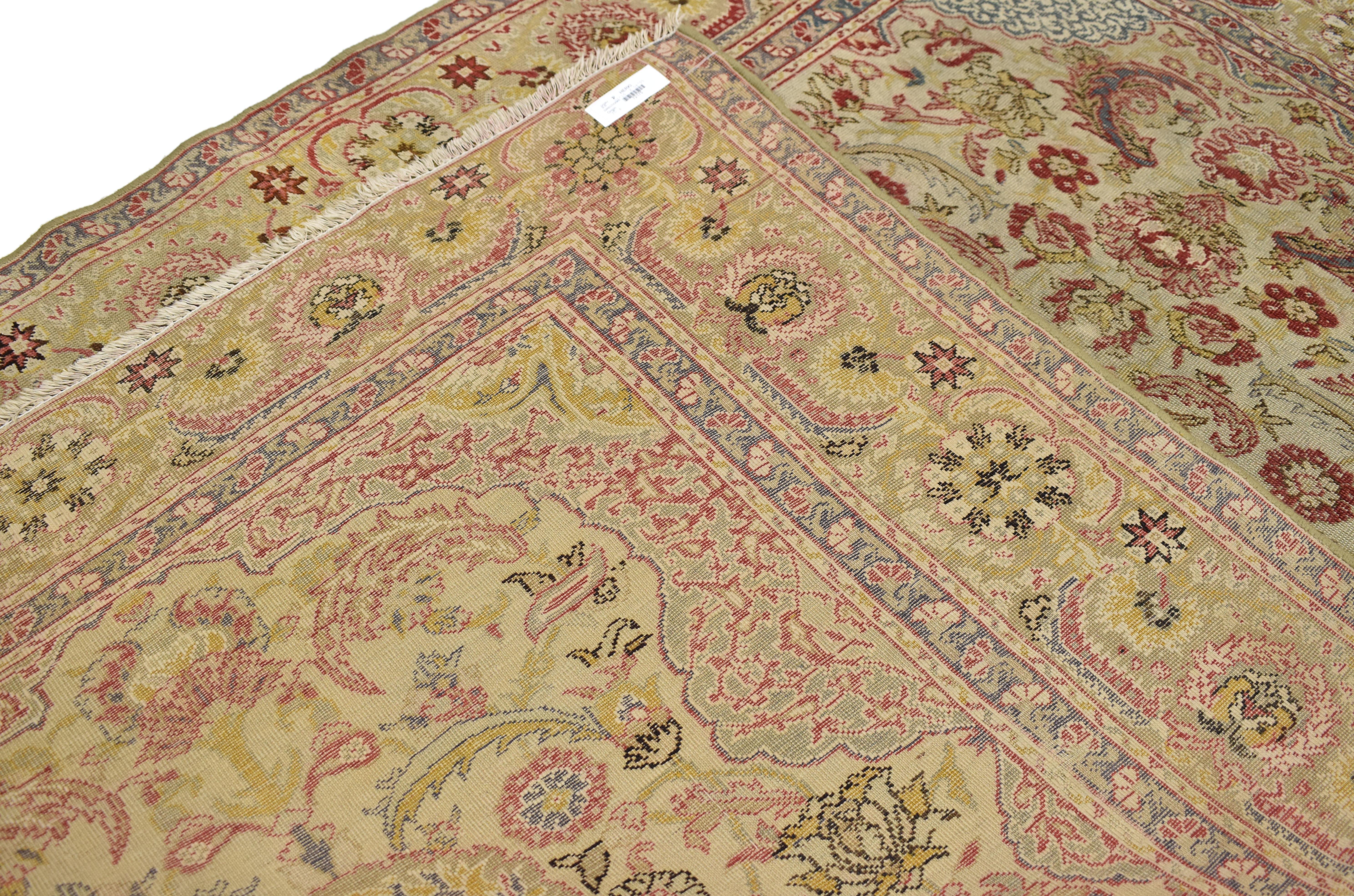 Hand-Knotted Distressed Antique Turkish Hereke Rug with Rustic English Country Cottage Style