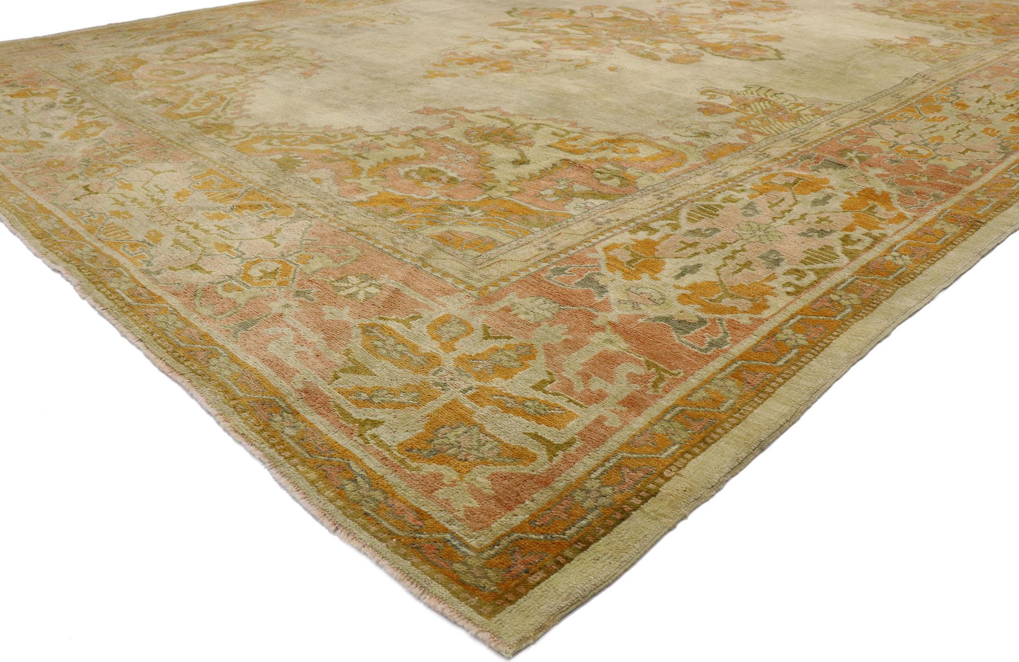 53390, distressed antique Turkish Oushak rug with Rustic Arts & Crafts style. With rustic charm and timeless appeal in an earthy-inspired colorway, this distressed antique Turkish Oushak rug will take on a curated lived-in look that feels timeless