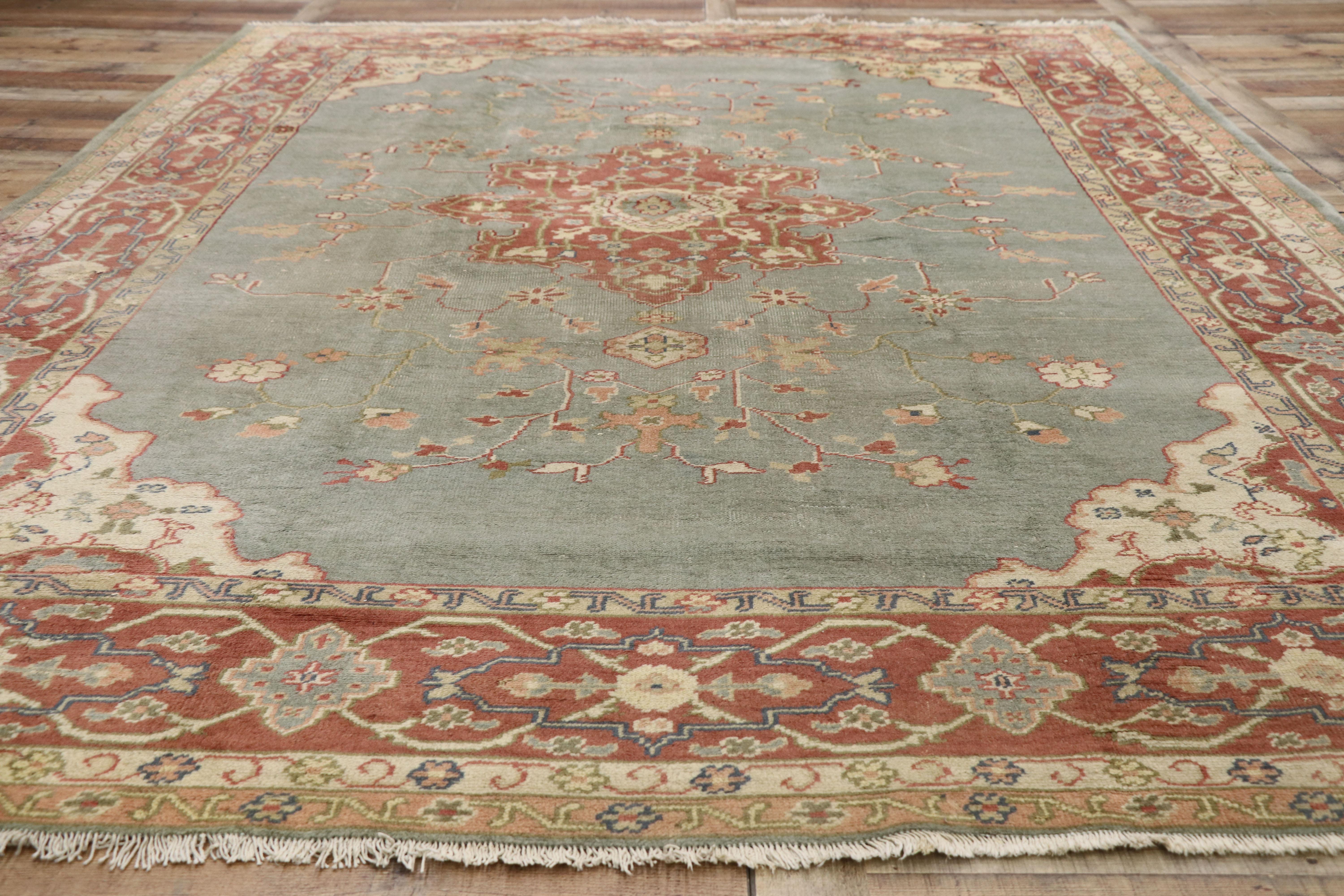 Wool Distressed Antique Turkish Oushak Rug with Rustic Georgian Arts & Crafts Style For Sale