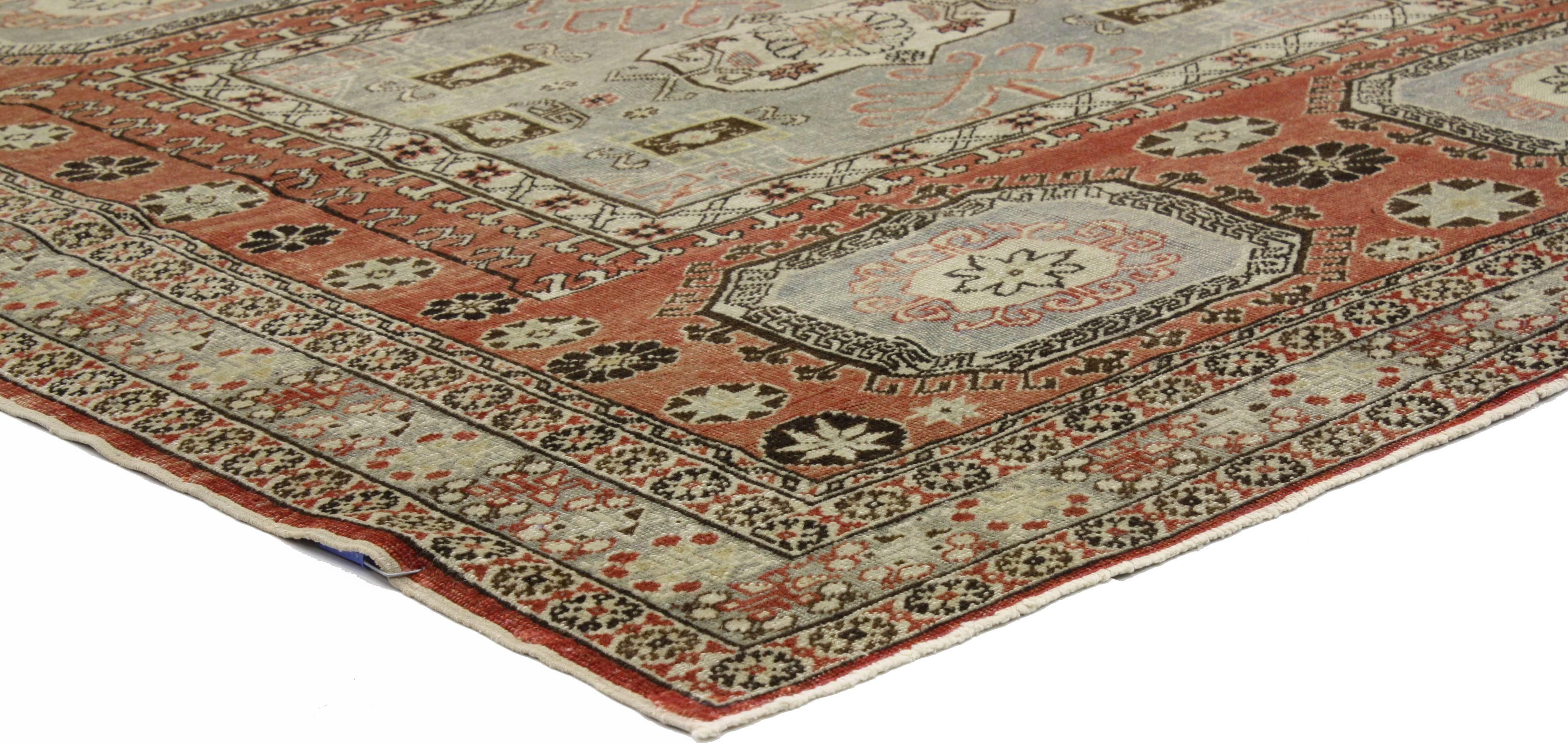 Distressed antique Turkish Sivas rug with Modern Rustic style, Square Accent rug. This hand-knotted wool antique Turkish Sivas square rug with modern rustic style features a rectangular gray medallion filled with double ram horn motifs and a