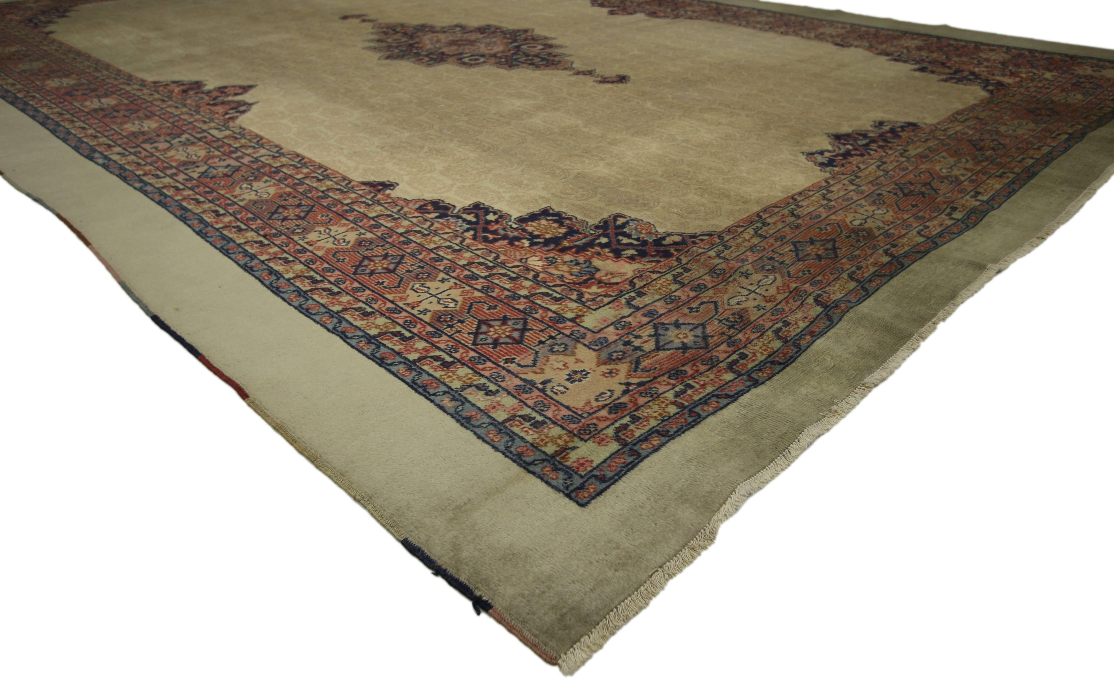 72224, distressed antique Turkish Sivas rug with rustic Feminine industrial style. This hand knotted wool distressed antique Turkish Sivas rug features a centre medallion with anchor pendants on either side. The medallion floats in an abrashed field