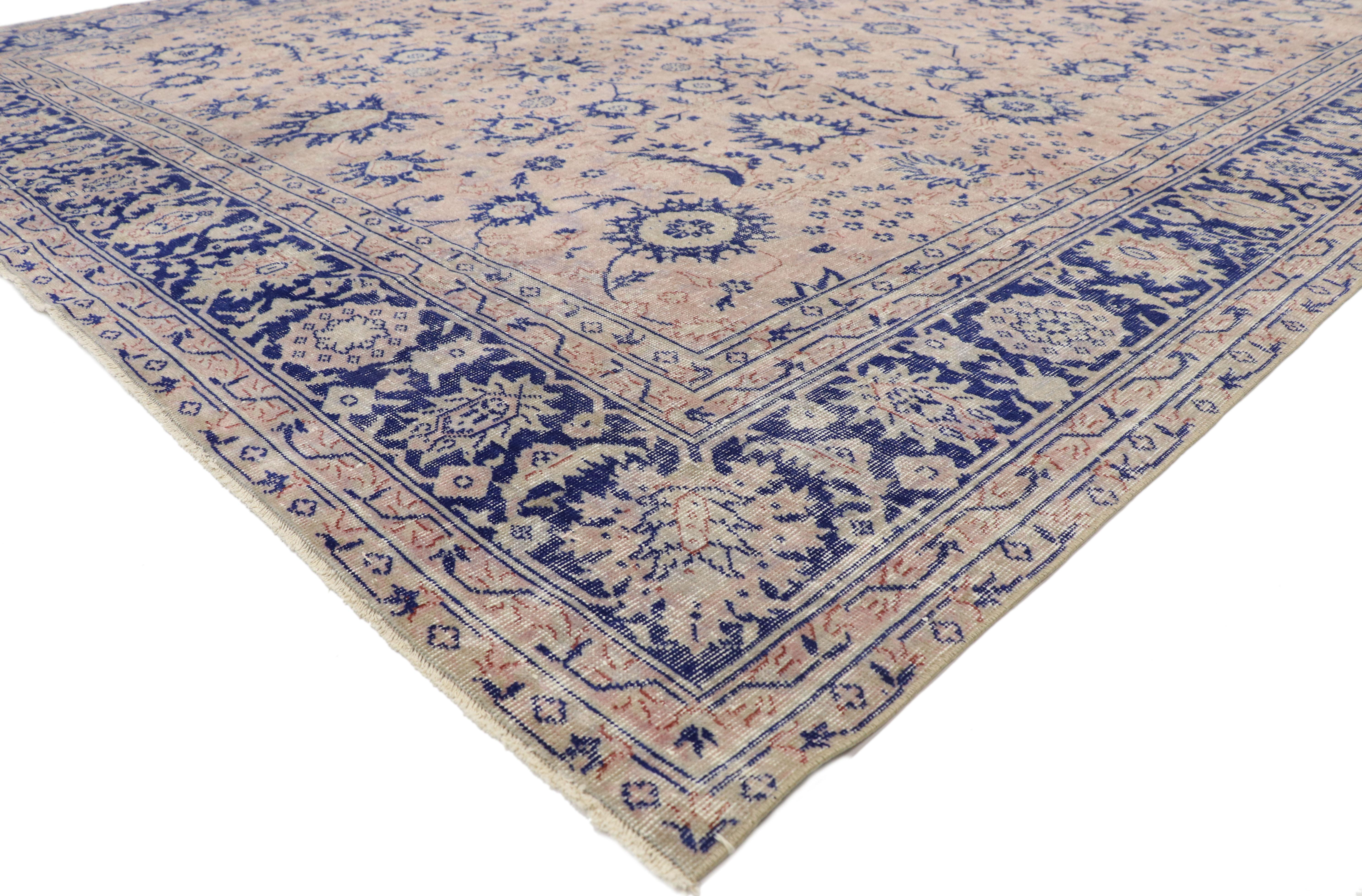 70944, distressed antique Turkish Sparta Palace rug with French Provincial and Georgian style. Bespeaking French cultural influence with an impressive array of realistic floral elements and lovingly timeworn appearance, this hand knotted wool