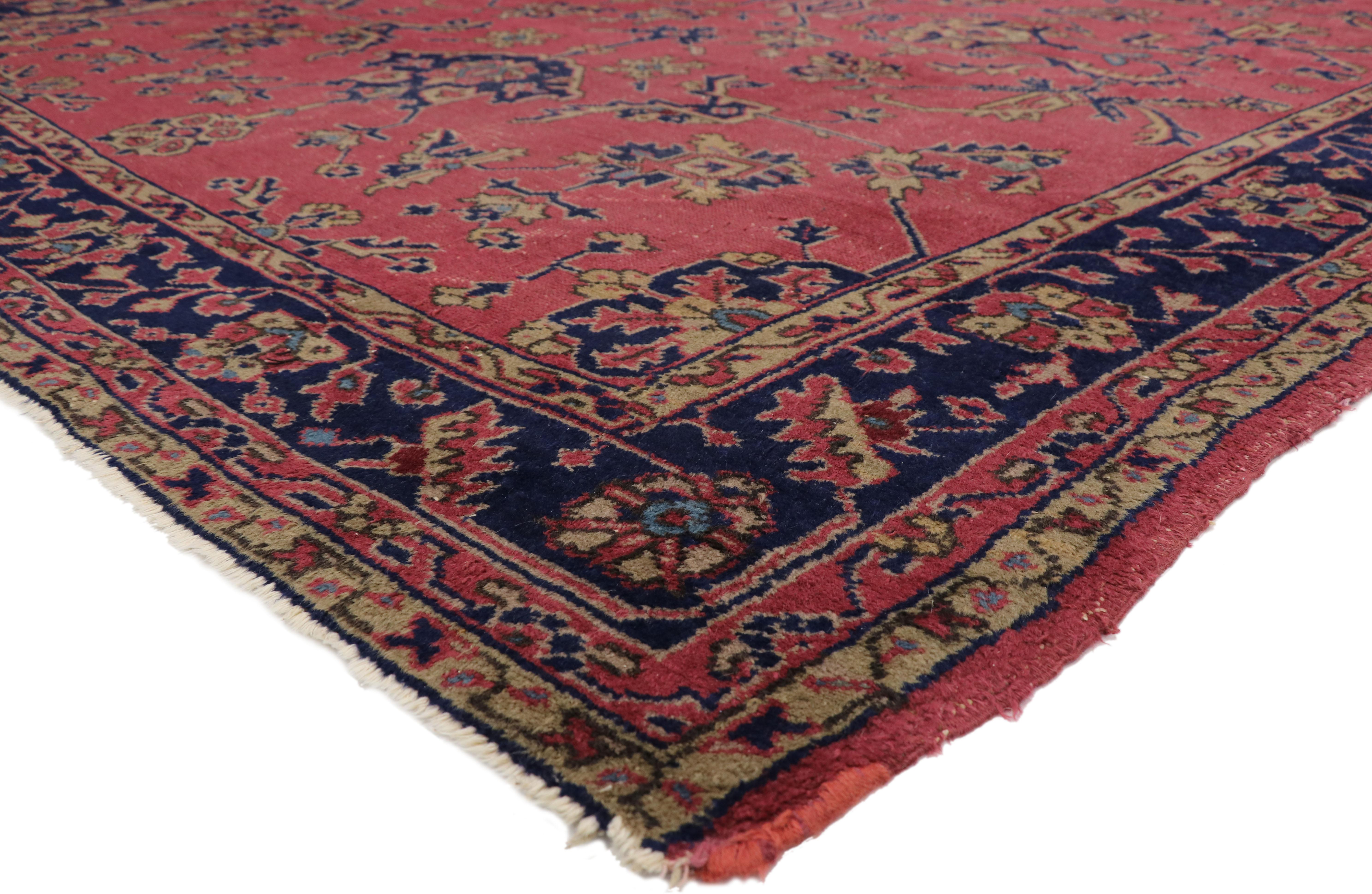 77365, distressed antique Turkish Sparta rug with Industrial Romantic Venetian style 09'05 x 11'07. Ravishing and vibrant this hand knotted wool distressed antique Turkish Sparta rug features an all-over pattern on a rosy rouge backdrop. Splayed