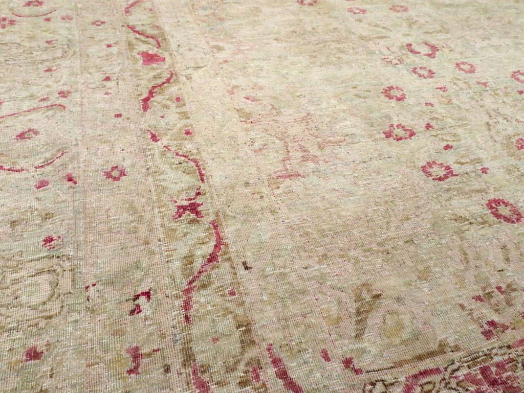 Distressed Beige, Green, and Pink Persian Lavar Kerman Carpet In Distressed Condition In New York, NY