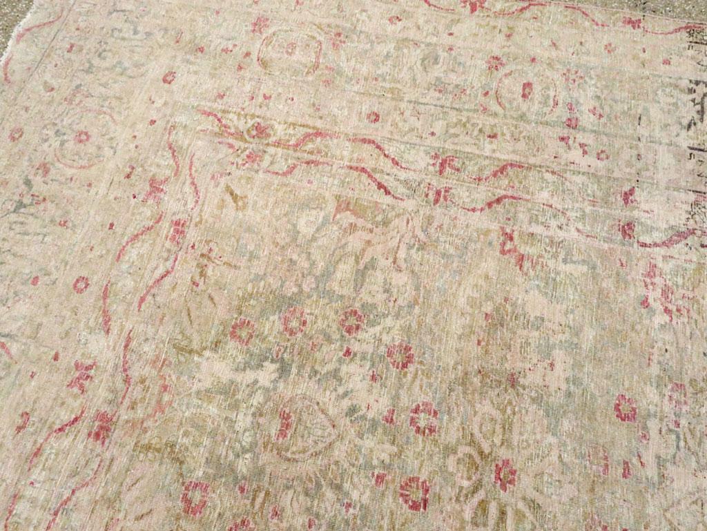20th Century Distressed Beige, Green, and Pink Persian Lavar Kerman Carpet