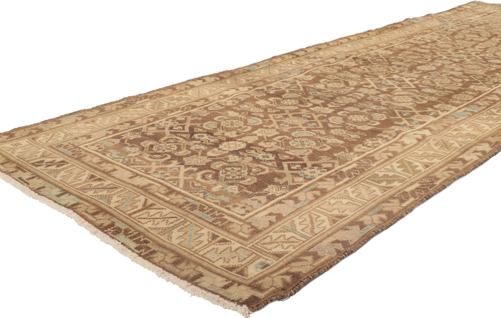 53740 Antique Persian Malayer runner, 03'05 x 09'07. The abrashed brown field features a small-scale Herati pattern spread across the composition. The Classic Herati design, also known as the Mahi or Fish pattern, is amongst the most widespread and